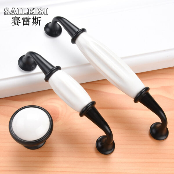 Cửa tủ gốm đen trắng tay cầm vàng chrome cổ Châu Âu hợp kim nhôm tủ quần áo tay cầm ngăn kéo tay cầm phần cứng